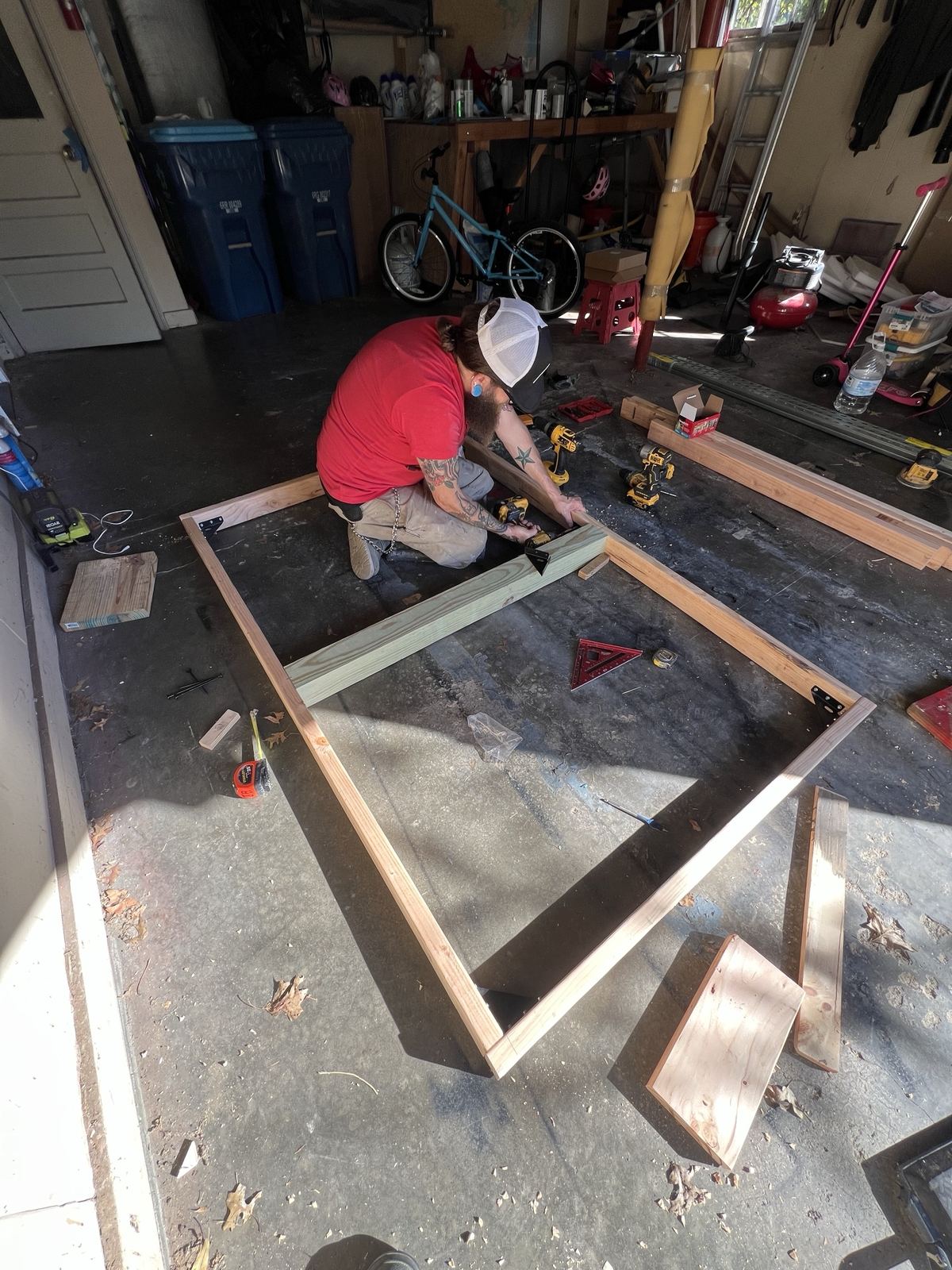 Laying out the timber frame on the garage floor