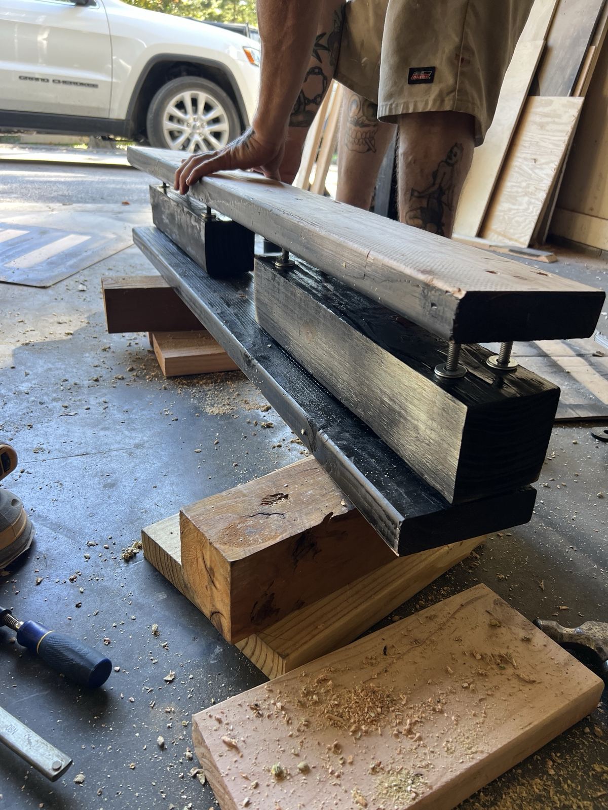 Bolted see-saw beam of 2x6 outer members and 4x4 inners
