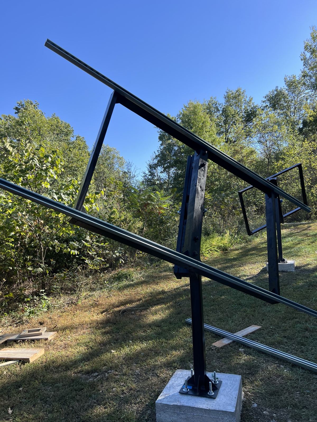 Rolled frame with long strut rails in place